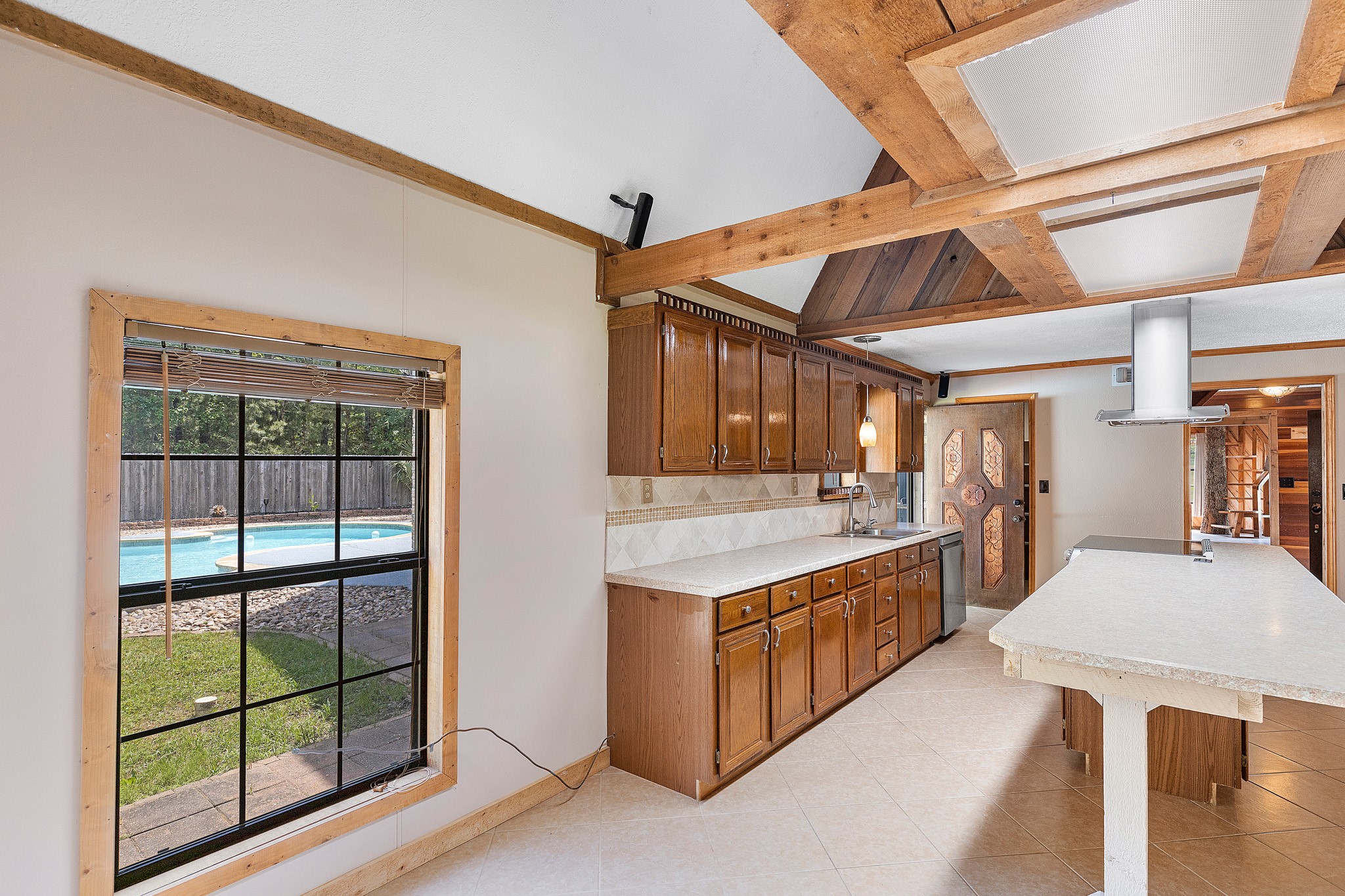 230 Walnut Drive Trinity, TX 75862 - Photo 9 of 48 The charming breakfast nook to start your day with sunlit mornings overlooking the pool!