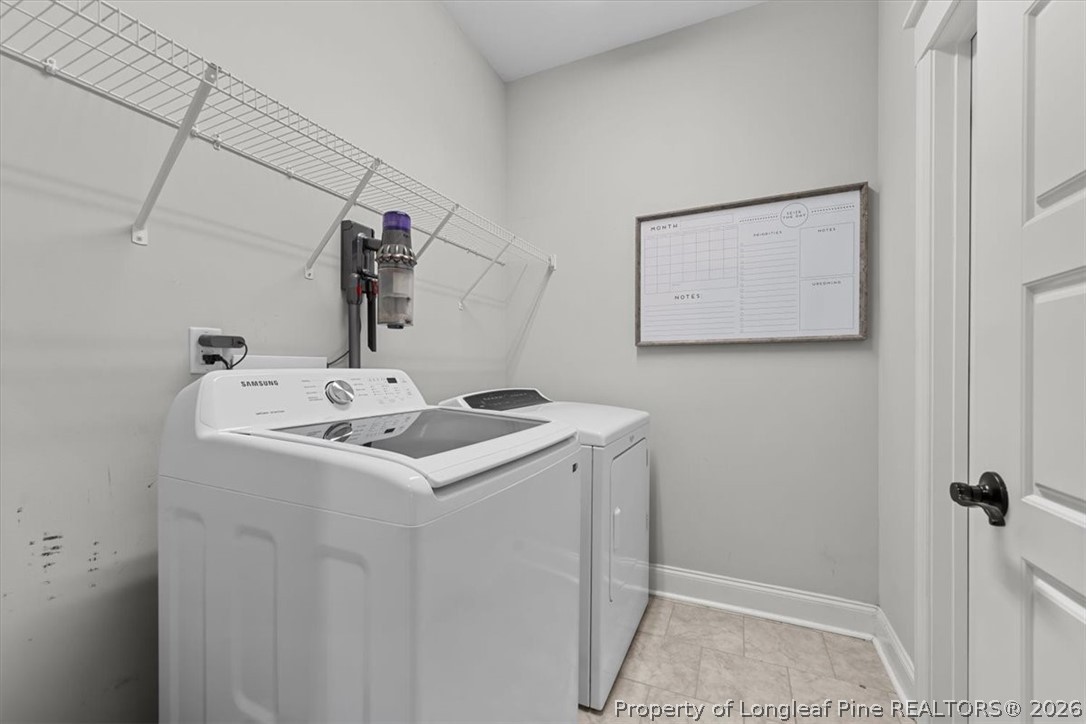 650 Cromwell Court Carthage, NC 28327 - Photo 30 of 39 a utility room with dryer and washer