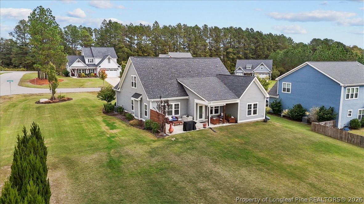 650 Cromwell Court Carthage, NC 28327 - Photo 32 of 39 an aerial view of residential houses with yard and trees