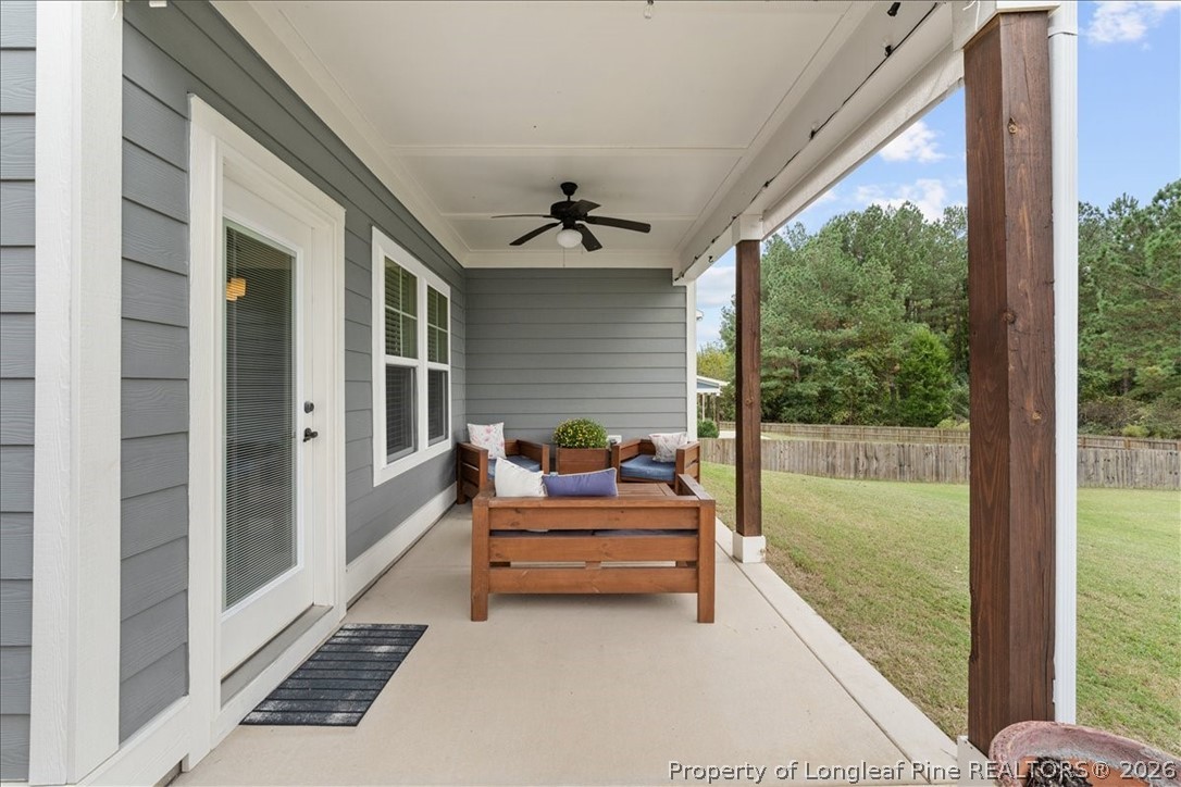 650 Cromwell Court Carthage, NC 28327 - Photo 34 of 39 a balcony view with a large window and living space
