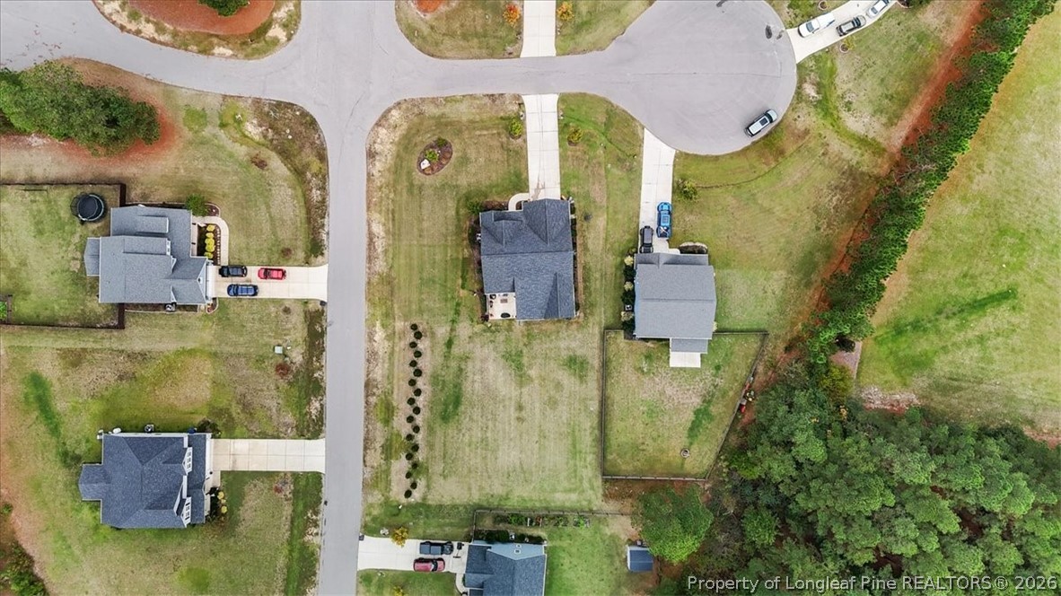 650 Cromwell Court Carthage, NC 28327 - Photo 37 of 39 aerial view of a residential apartment building with a yard
