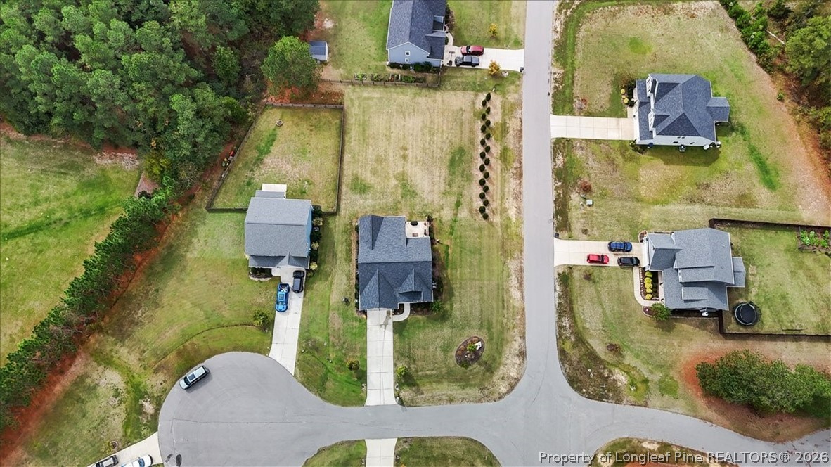 650 Cromwell Court Carthage, NC 28327 - Photo 38 of 39 an aerial view of residential houses with outdoor space