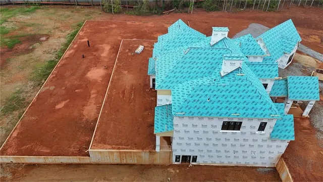 a view of a bench in back yard