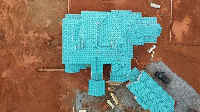 an aerial view of a house with garden