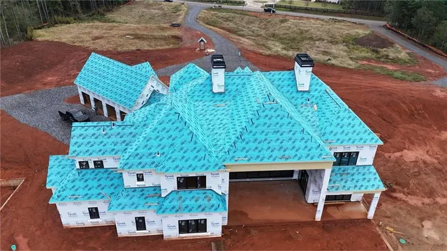 a front view of a house with yard