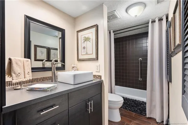 a view of a lake with houses