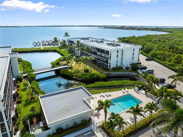 a table with chairs and a table with wooden floor