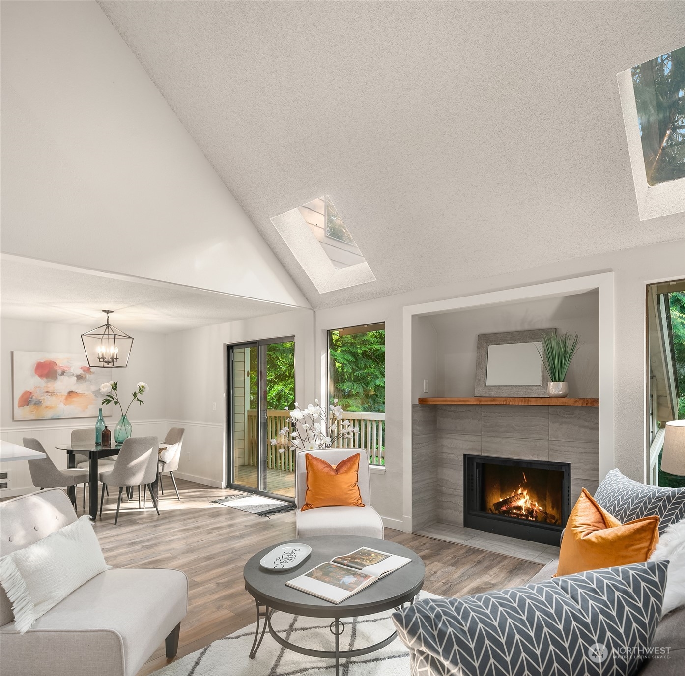 1555 Union Avenue Northeast, Unit 57 Renton, WA 98059 - Photo 1 of 28 a living room with furniture and a fireplace
