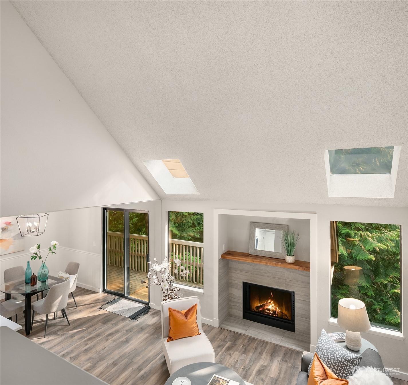 1555 Union Avenue Northeast, Unit 57 Renton, WA 98059 - Photo 18 of 28 a living room with furniture large window and a fireplace