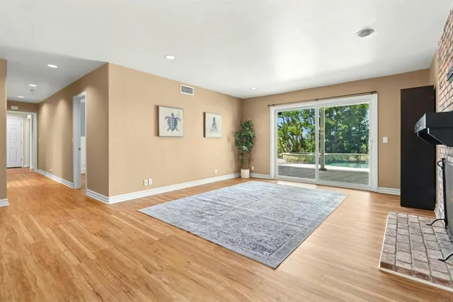 a view of an empty room and window