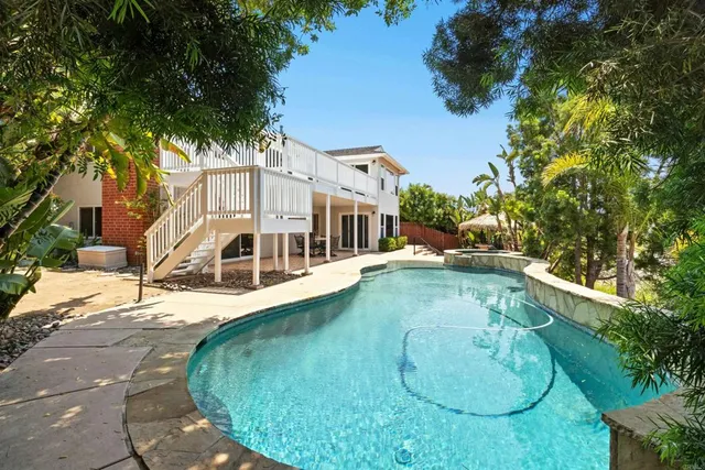 a view of a house with swimming pool