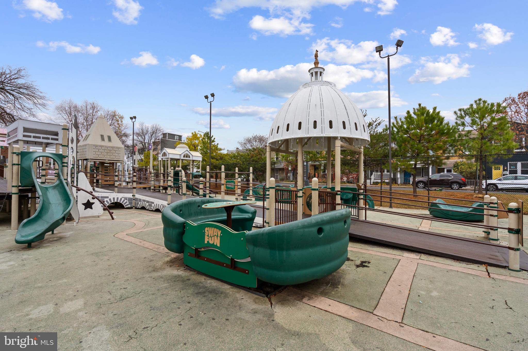 1909 Rosedale Street Northeast, Unit 3 Washington, DC 20002 - Photo 19 of 23 a view of a swimming pool with a patio and plants