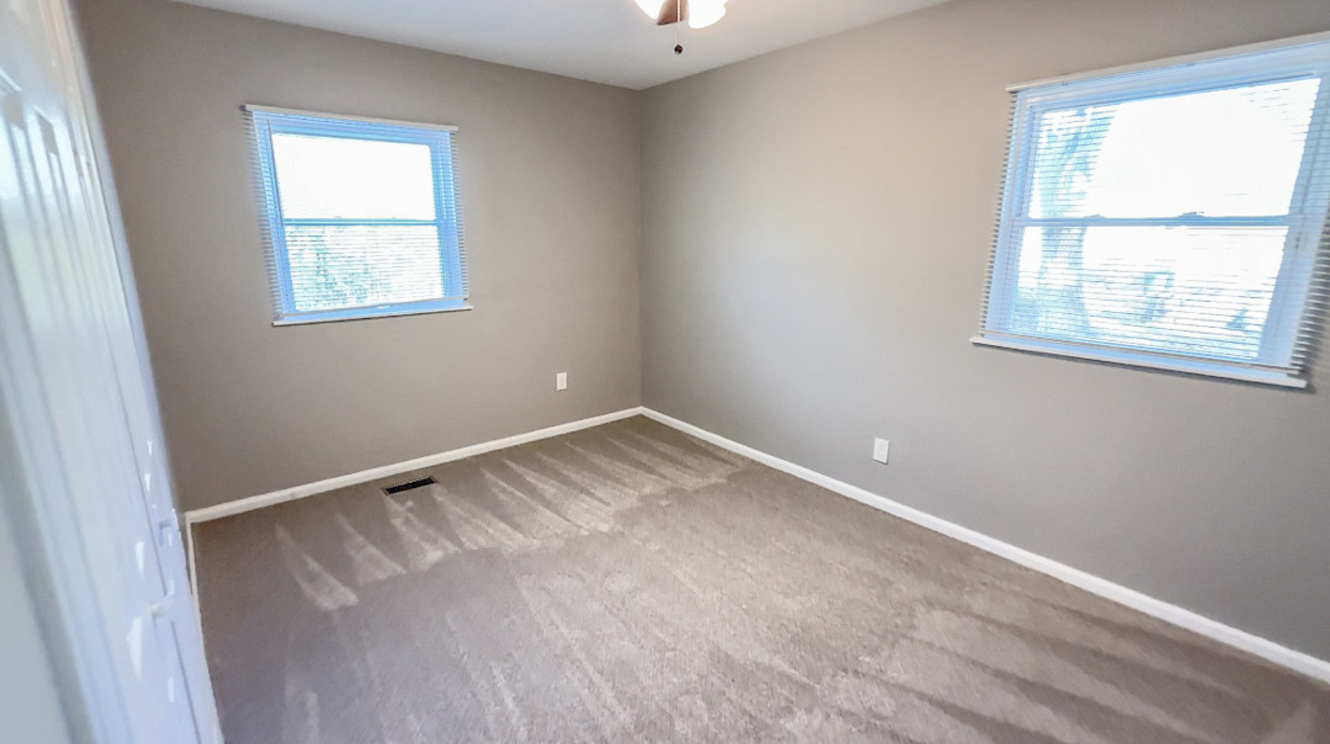 3334 Ridgewood Drive Champaign, IL 61821 - Photo 7 of 9 a view of an empty room with a window
