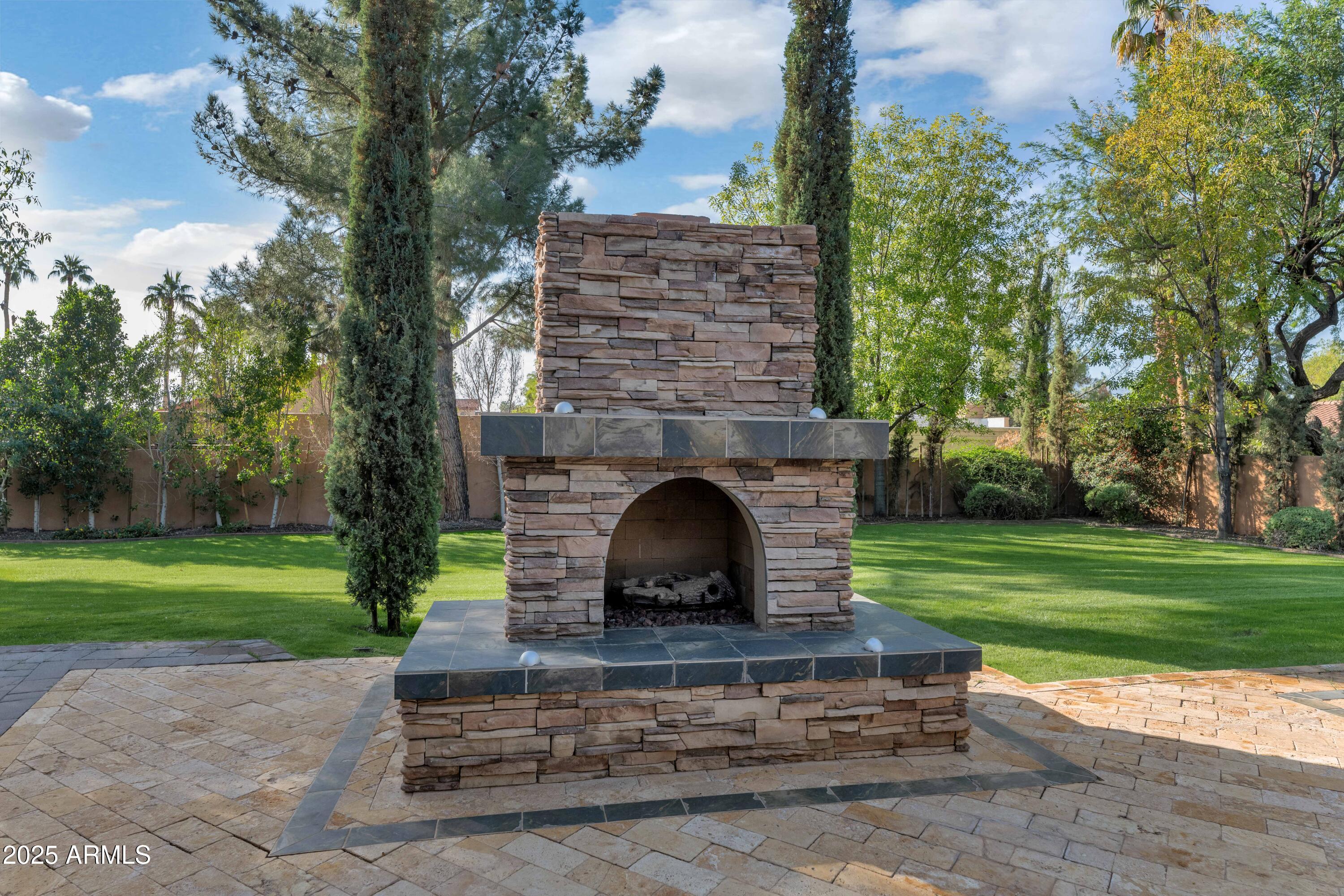 7233 East Royal Palm Road Scottsdale, AZ 85258 - Photo 42 of 54 Outdoor Fireplace