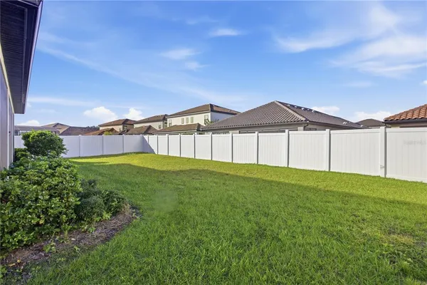 a front view of a house with yard