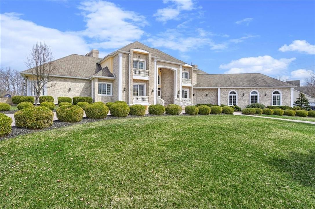 2 Prince Lane sits elevated on 4.9 acres with pond.