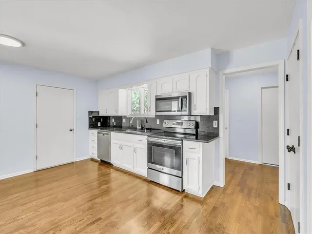 $355,000 | 801 Northeast Fairway Homes Court, Lee's Summit, MO 64064