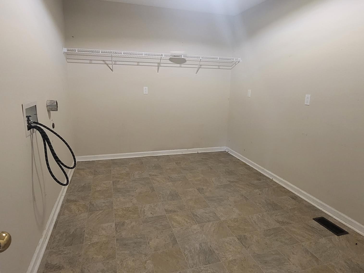 744 Needmore Road Clarksville, TN 37040 - Photo 11 of 12 a view of a room with racks on the wall