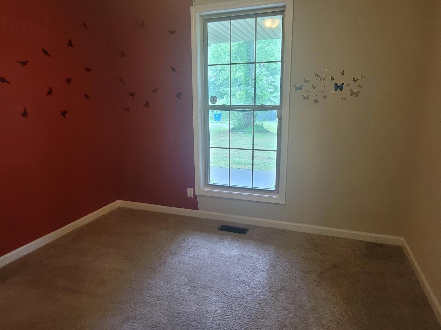 744 Needmore Road Clarksville, TN 37040 - Photo 8 of 12 an empty room with a window