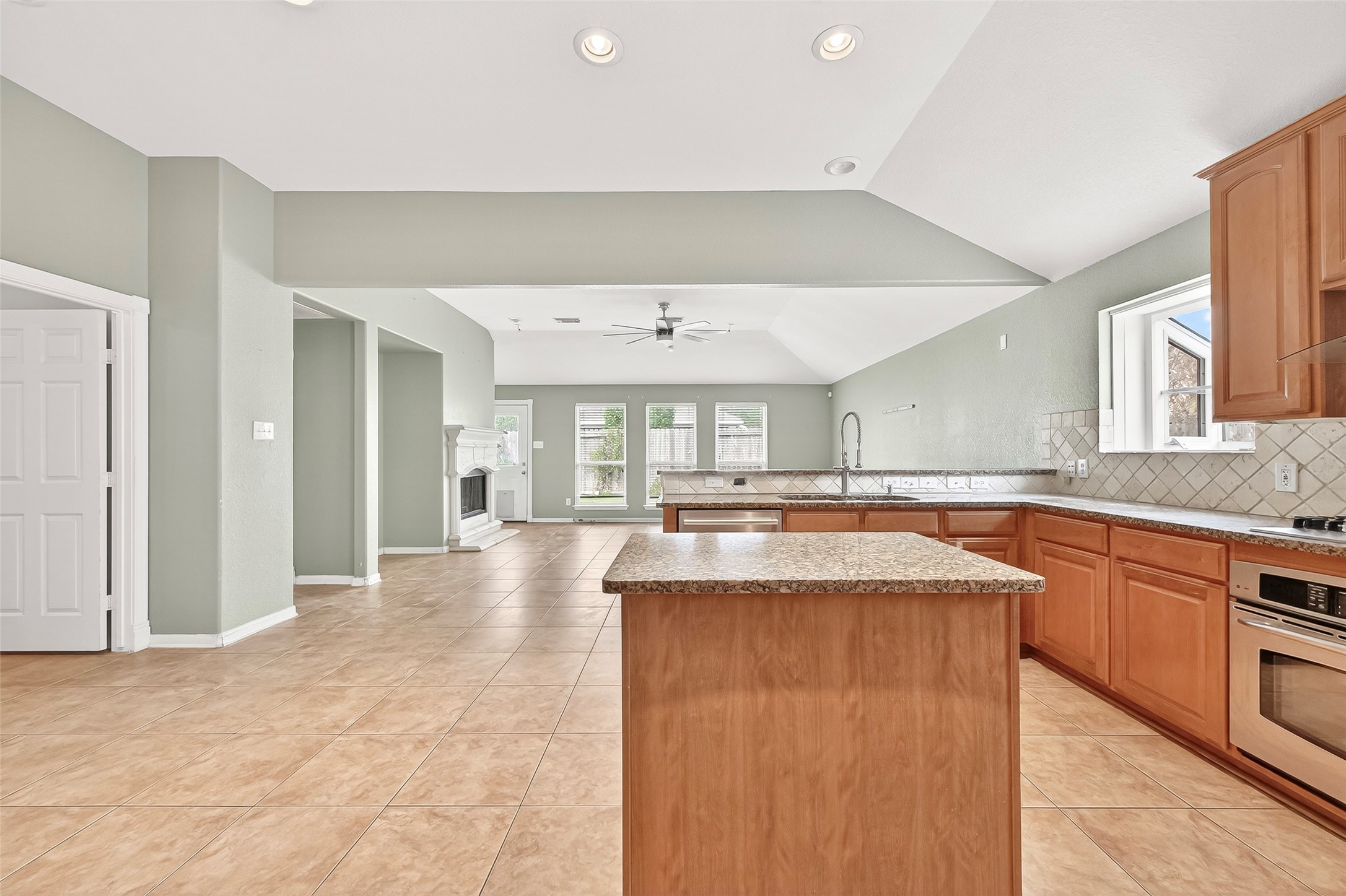 21018 Ripford Court Richmond, TX 77406 - Photo 20 of 48 The kitchen over looks the living room giving an inclusive feel