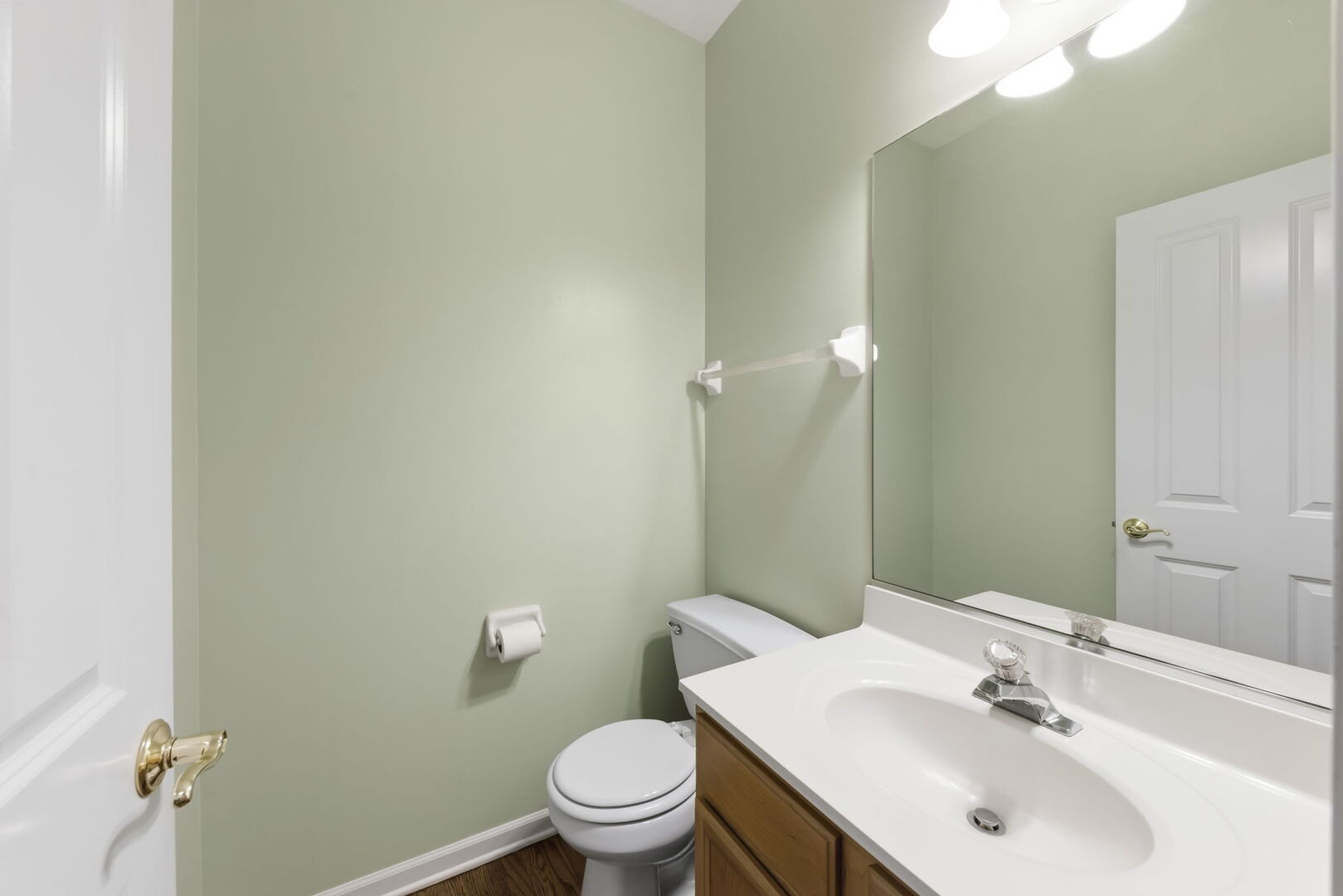 1728 Pershing Avenue, Unit 3 Wheaton, IL 60189 - Photo 11 of 32 a bathroom with a sink mirror and toilet