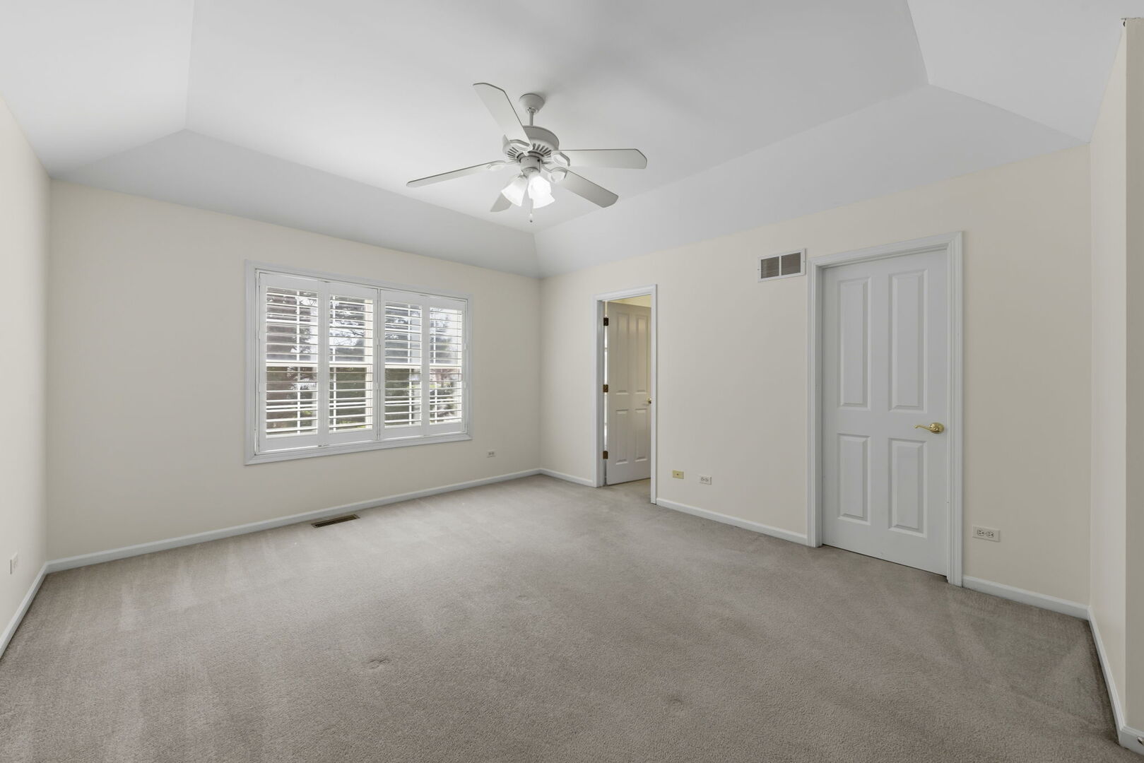 1728 Pershing Avenue, Unit 3 Wheaton, IL 60189 - Photo 14 of 32 a view of an empty room with a window