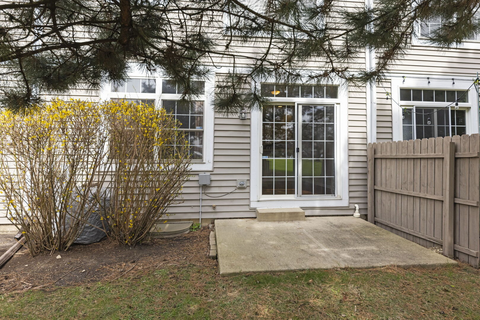 1728 Pershing Avenue, Unit 3 Wheaton, IL 60189 - Photo 23 of 32 a view of front door of house with an outdoor space
