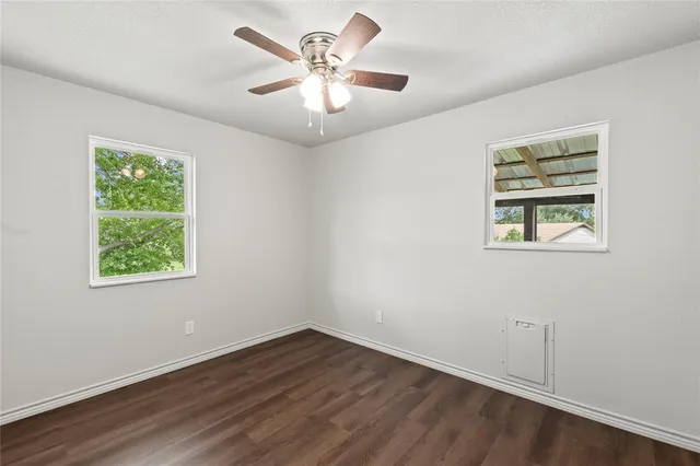a kitchen with a stove and a microwave