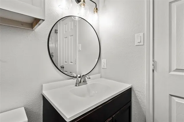 a bathroom with a shower and a window