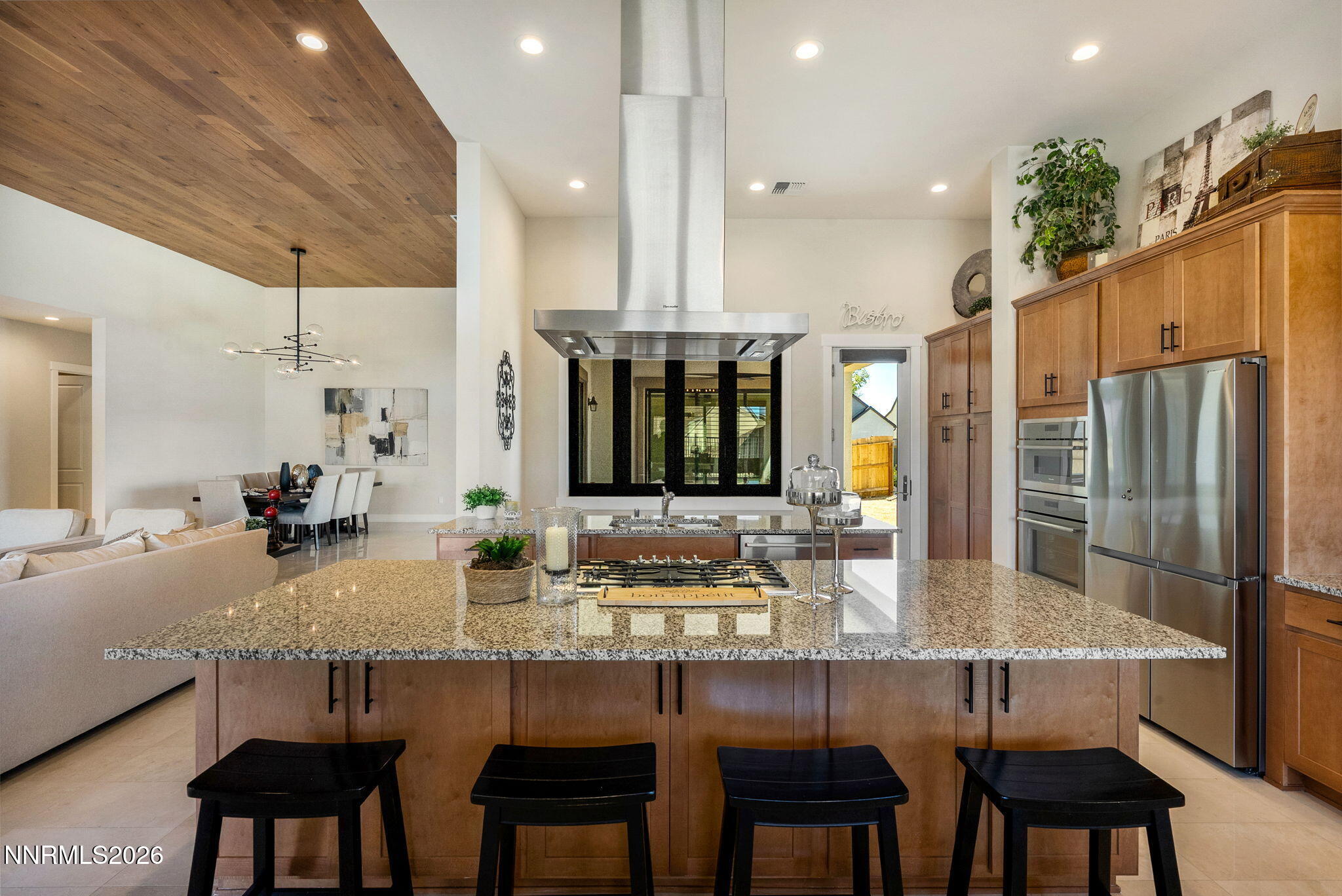 2955 Saddle Peak Drive Reno, NV 89521 - Photo 13 of 38 a kitchen with center island table and chairs