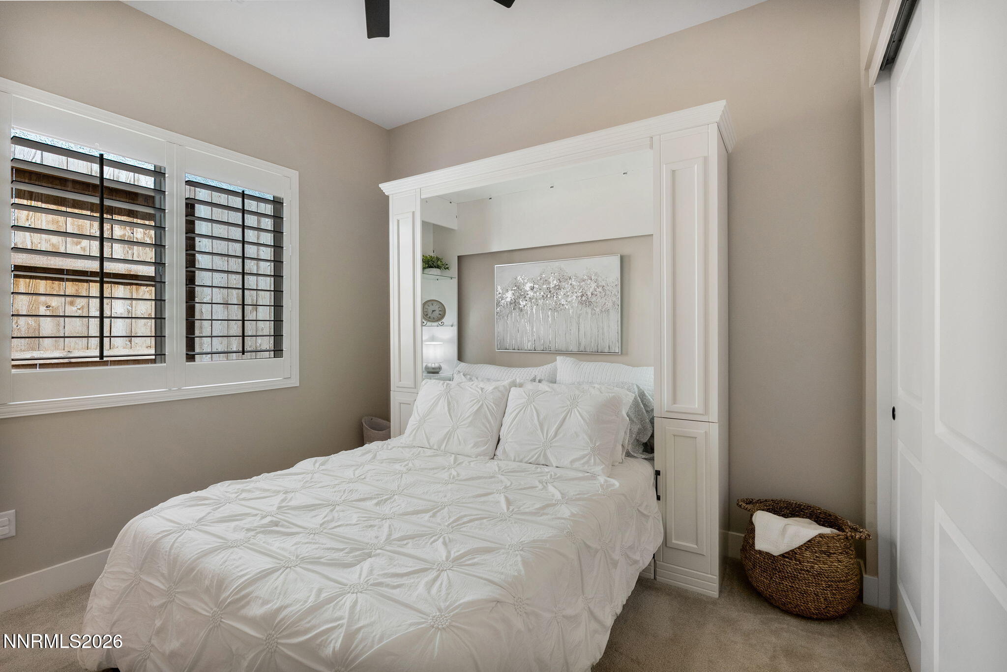 2955 Saddle Peak Drive Reno, NV 89521 - Photo 21 of 38 a bedroom with a bed and a window