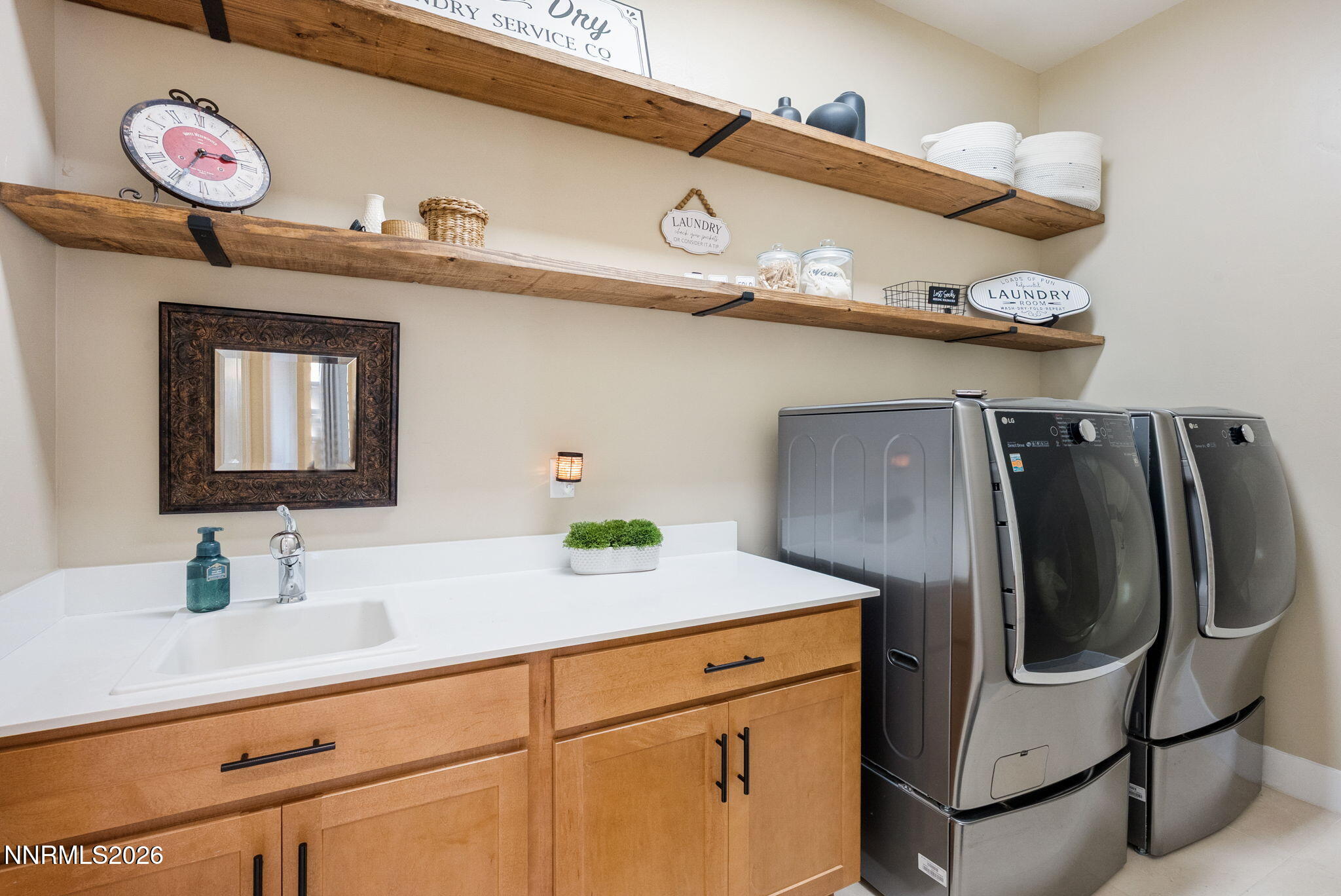 2955 Saddle Peak Drive Reno, NV 89521 - Photo 26 of 38 a bathroom with a sink and a mirror