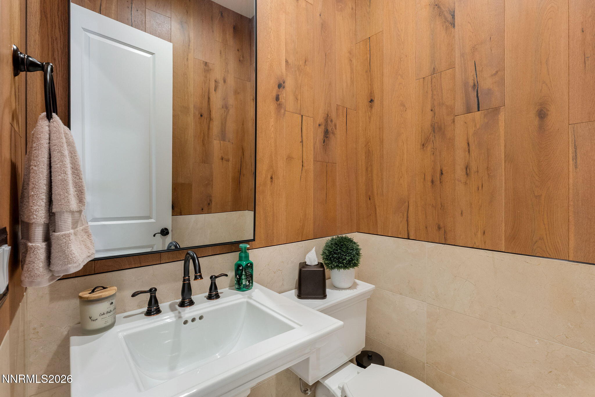 2955 Saddle Peak Drive Reno, NV 89521 - Photo 27 of 38 a bathroom with a sink and a mirror