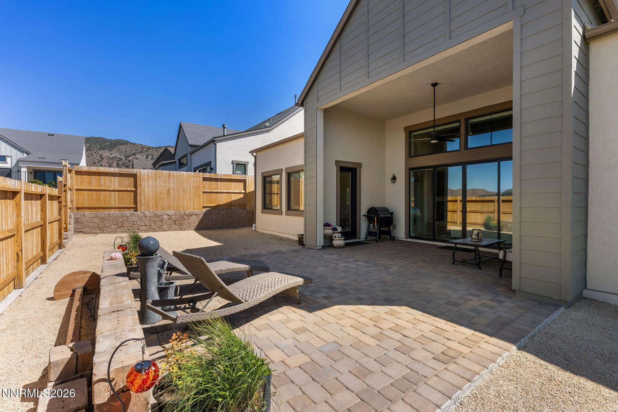 2955 Saddle Peak Drive Reno, NV 89521 - Photo 29 of 38 a view of a house with backyard and sitting area
