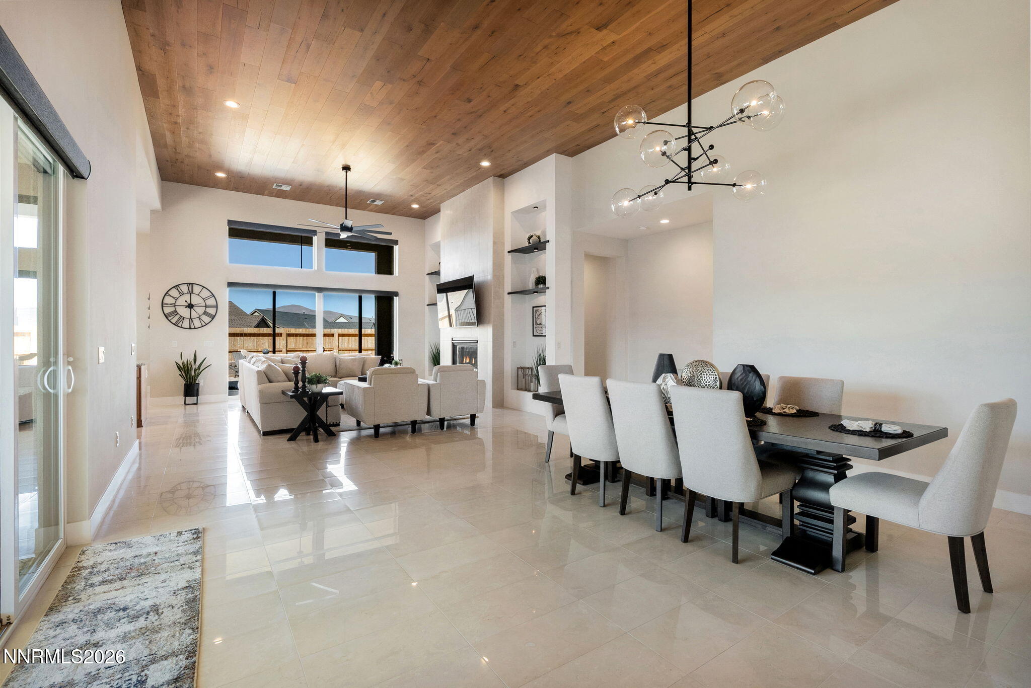 2955 Saddle Peak Drive Reno, NV 89521 - Photo 6 of 38 a living room with furniture and a chandelier