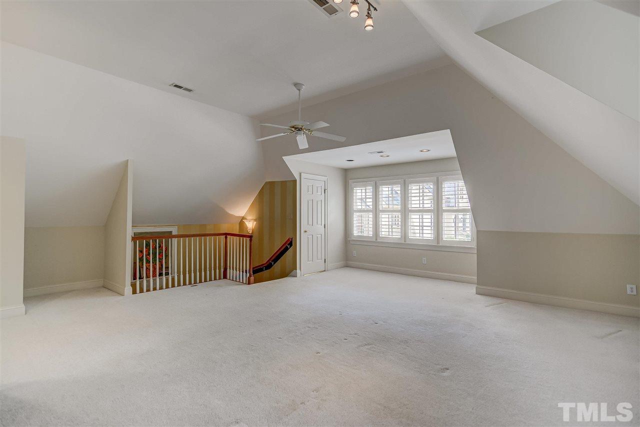 8112 Harps Mill Road Raleigh, NC 27615 - Photo 22 of 30 en view interior of a house with stairs