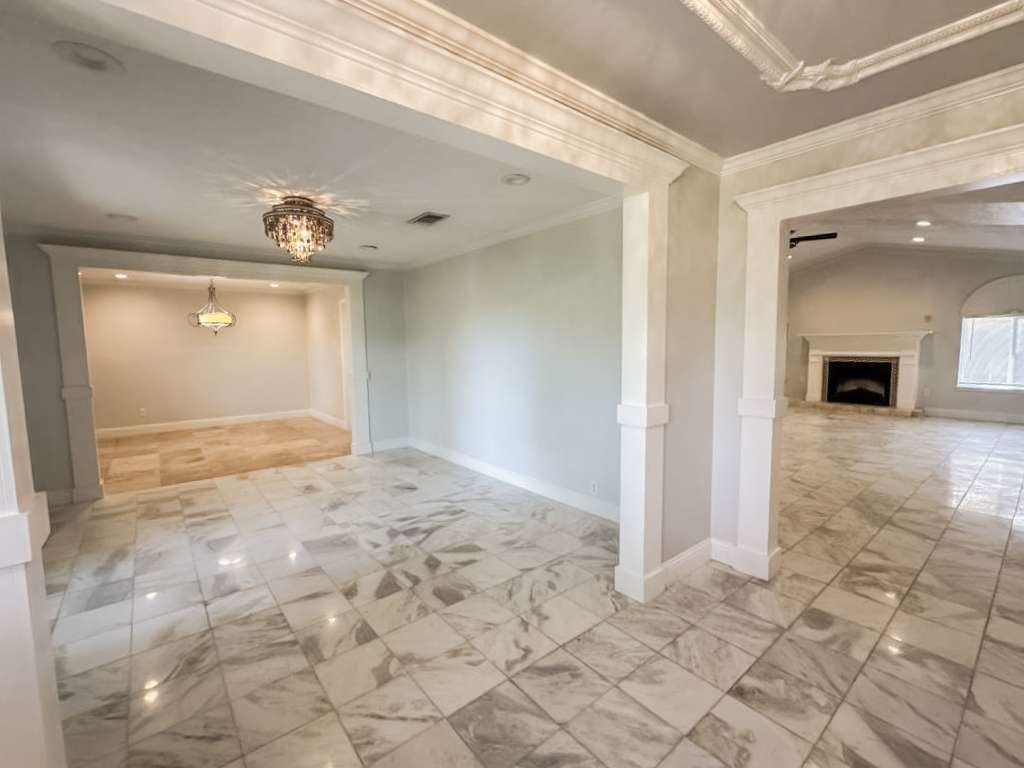 2323 Stevenson Road, Unit CR391 Pearland, TX 77581 - Photo 21 of 46 a view of a hallway with wooden floor and a living room