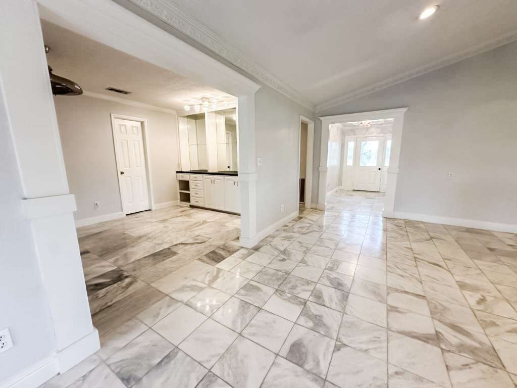 2323 Stevenson Road, Unit CR391 Pearland, TX 77581 - Photo 30 of 46 a view of a livingroom with wooden floor and kitchen space