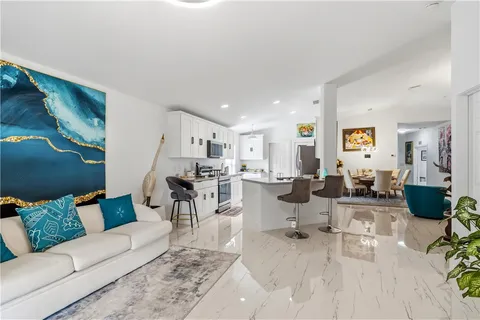 a living room with furniture and a view of living room