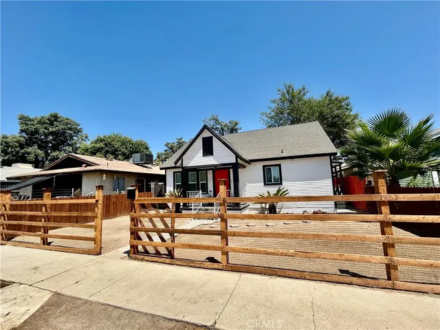a view of a house with car park