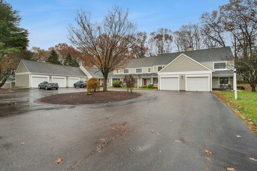 151 Stone Ridge Road, Unit 151 Franklin, MA 02038 - Photo 3 of 39 a view of house with outdoor space and tree in the background