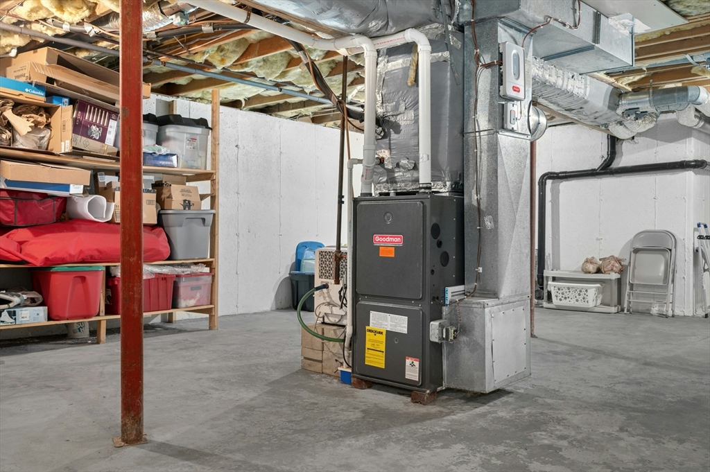151 Stone Ridge Road, Unit 151 Franklin, MA 02038 - Photo 31 of 39 a view of a chairs in a room