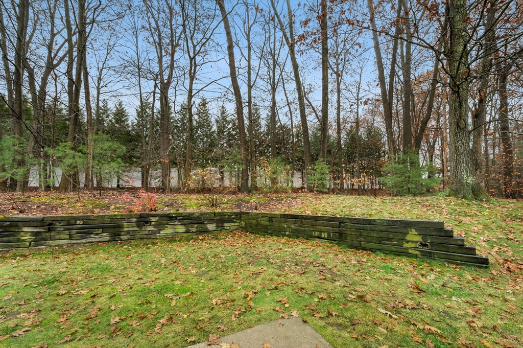 151 Stone Ridge Road, Unit 151 Franklin, MA 02038 - Photo 38 of 39 a view of swimming pool with a yard