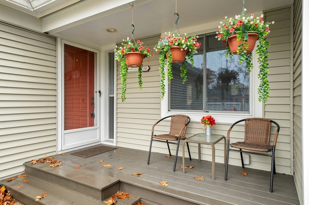 151 Stone Ridge Road, Unit 151 Franklin, MA 02038 - Photo 4 of 39 a view of a house with a porch