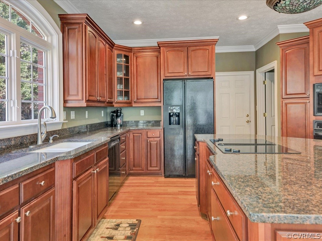 13711 Beechwood Point Road Midlothian, VA 23112 - Photo 13 of 49 a kitchen with stainless steel appliances granite countertop a sink a stove and a refrigerator