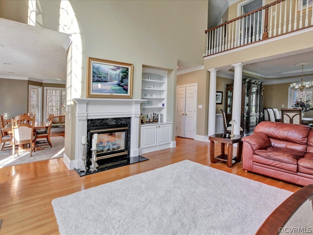 13711 Beechwood Point Road Midlothian, VA 23112 - Photo 15 of 49 a living room with furniture and a fireplace