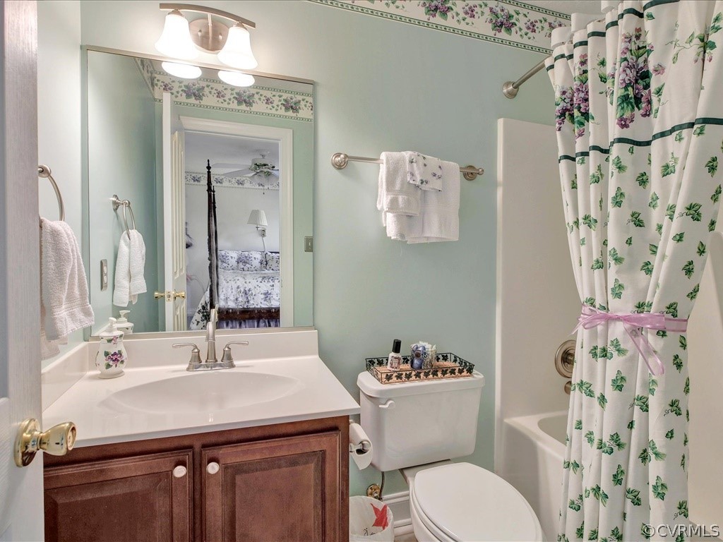 13711 Beechwood Point Road Midlothian, VA 23112 - Photo 22 of 49 a bathroom with a sink and a mirror