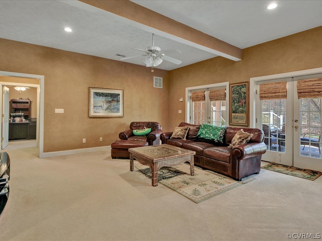 13711 Beechwood Point Road Midlothian, VA 23112 - Photo 32 of 49 a living room with furniture and large windows