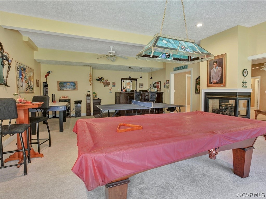 13711 Beechwood Point Road Midlothian, VA 23112 - Photo 39 of 49 a living room with furniture a table and kitchen view