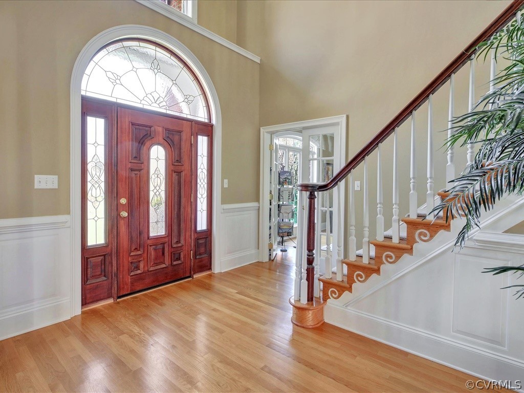13711 Beechwood Point Road Midlothian, VA 23112 - Photo 5 of 49 a view of entryway with wooden floor and stairs